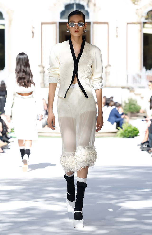 Olympic Champion Eileen Gu walks for Bosideng at Milan Fashion Week.